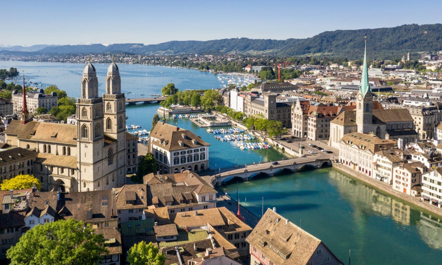 Zurich old town by the Limmat river on a sunny summer day in Switzerland largest city