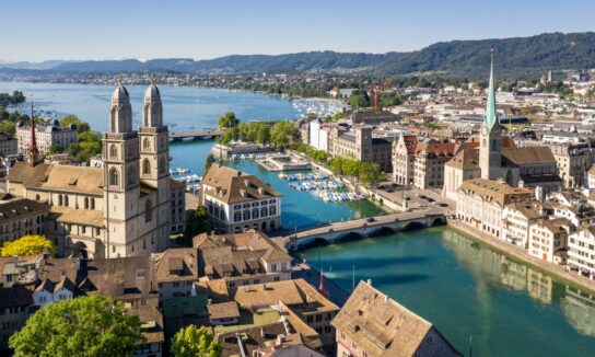 Zurich old town by the Limmat river on a sunny summer day in Switzerland largest city
