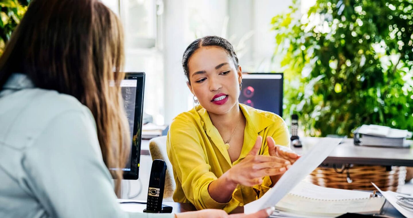 woman sharing results of investment with customer