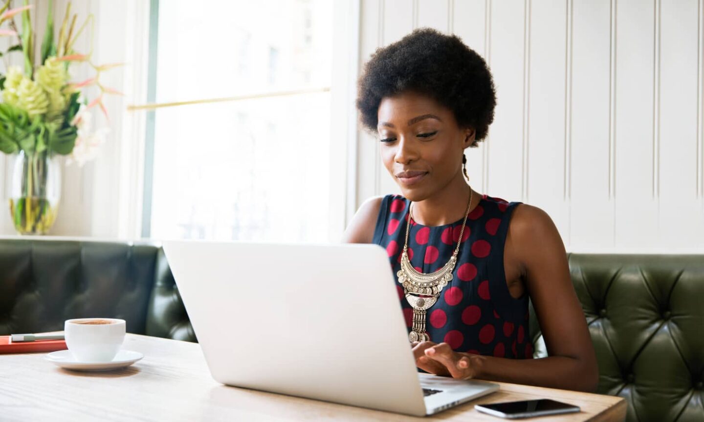 black-woman-using-a-laptop-working-from-home